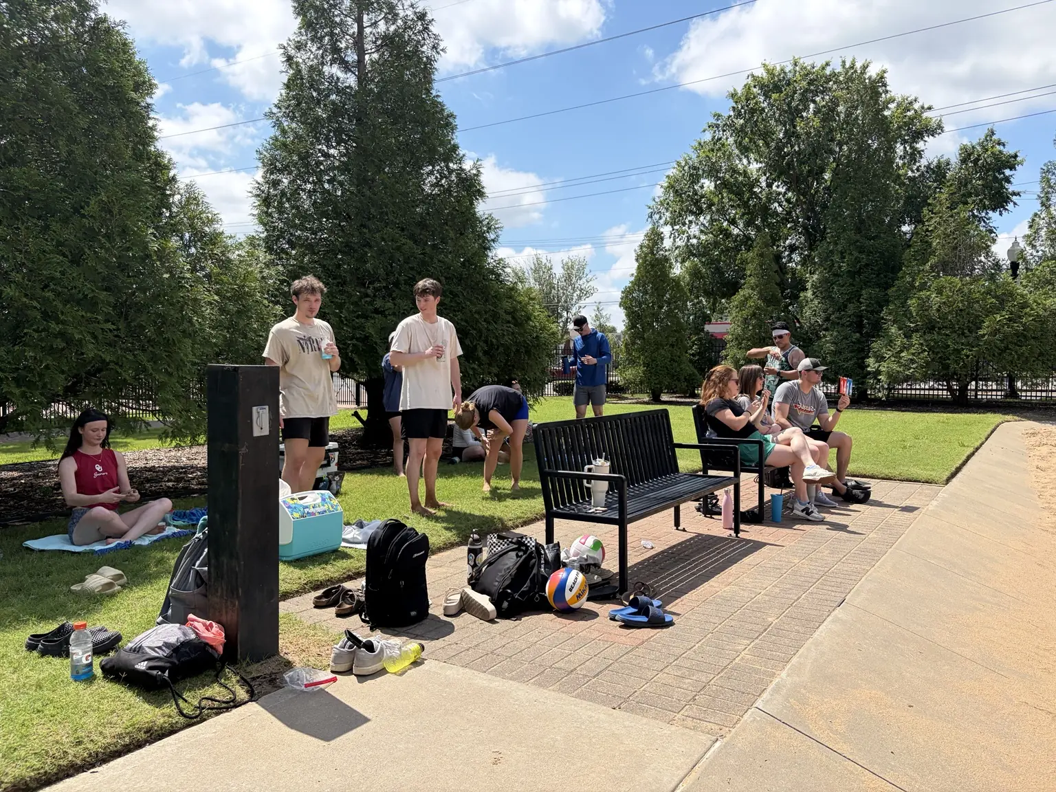 Players resting near the scorer table between Sandline games